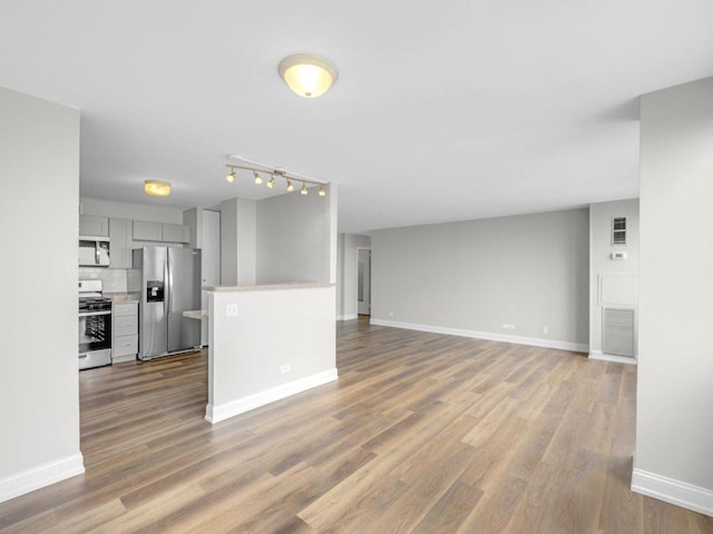 4850 S Lake Park Ave Unit 2508B, Chicago, IL 60615 - unfurnished living room with wood finished floors