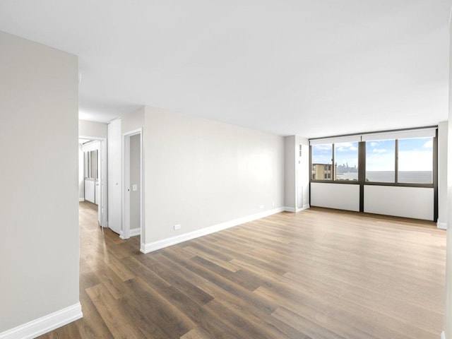 4850 S Lake Park Ave Unit 2508B, Chicago, IL 60615 - empty room with wood finished floors and baseboards