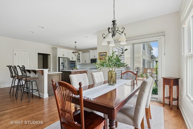 76 Landon Cir, Wheaton, IL 60189 - dining space featuring light wood-type flooring, a chandelier, and recessed lighting