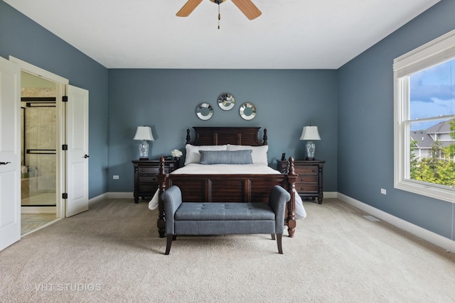 76 Landon Cir, Wheaton, IL 60189 - bedroom with light colored carpet, connected bathroom, and ceiling fan