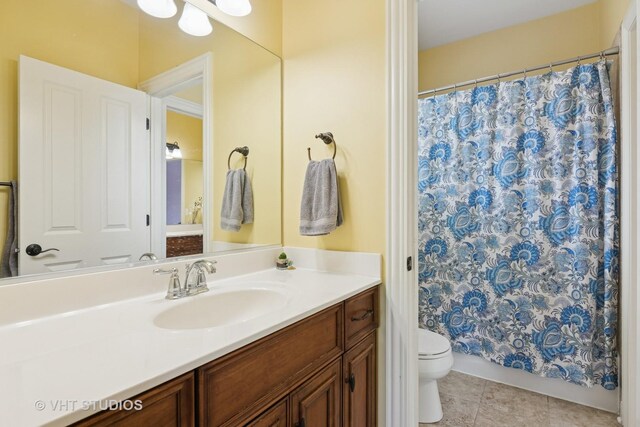 76 Landon Cir, Wheaton, IL 60189 - bathroom featuring vanity, tile patterned flooring, and shower / bathtub combination with curtain