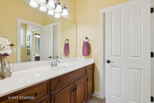 76 Landon Cir, Wheaton, IL 60189 - bathroom with vanity and tile patterned floors