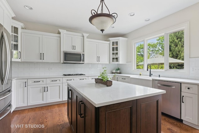76 Landon Cir, Wheaton, IL 60189 - kitchen with stainless steel appliances, white cabinetry, backsplash, and recessed lighting