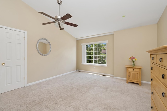 6941 Brightwater Dr, Fox Lake, IL 60020 - unfurnished bedroom with vaulted ceiling, light carpet, and ceiling fan
