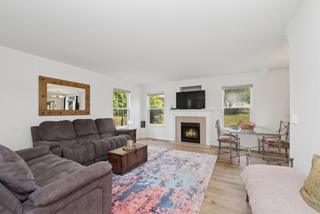 6941 Brightwater Dr, Fox Lake, IL 60020 - living area with light wood-style flooring and a fireplace