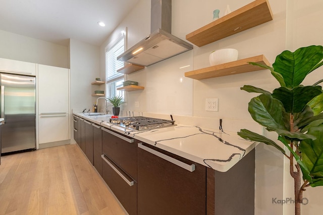 2414 W Grenshaw St Unit 1E, Chicago, IL 60612 - kitchen featuring open shelves, appliances with stainless steel finishes, wall chimney range hood, light wood finished floors, and recessed lighting