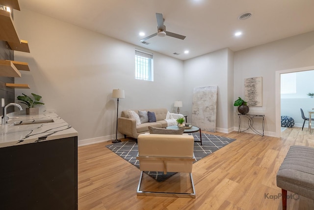 2414 W Grenshaw St Unit 1E, Chicago, IL 60612 - living room featuring a ceiling fan, light wood-style floors, and recessed lighting