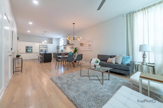 2414 W Grenshaw St Unit 1E, Chicago, IL 60612 - living room featuring a chandelier, light wood finished floors, recessed lighting, and ceiling fan