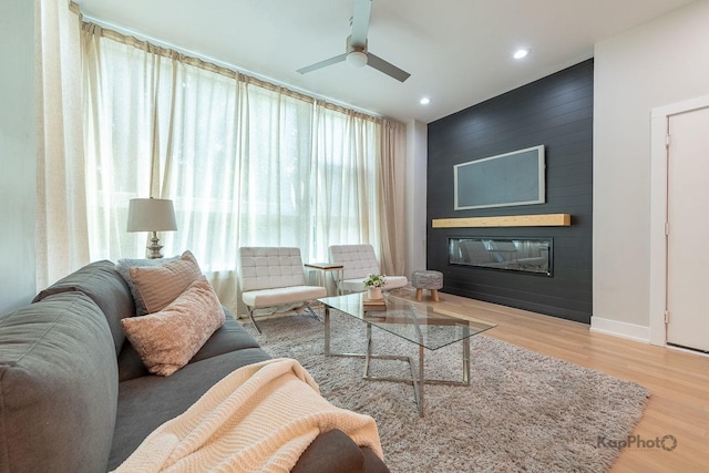 2414 W Grenshaw St Unit 1E, Chicago, IL 60612 - living area featuring a fireplace, ceiling fan, wood finished floors, and recessed lighting