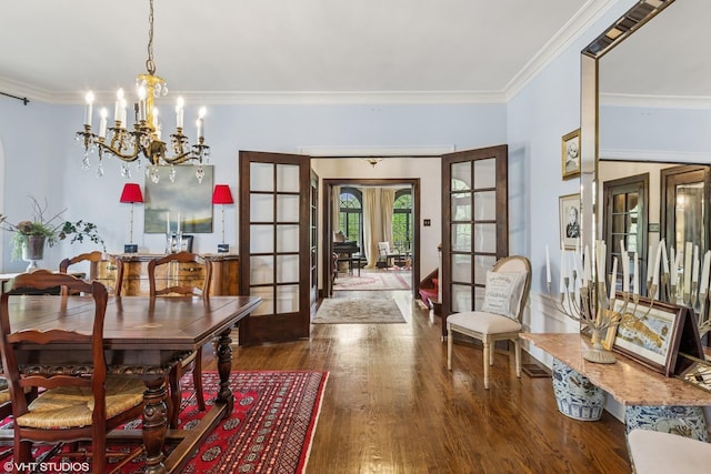 1141 N Ridgeland Ave, Oak Park, IL 60302 - dining room with french doors, wood finished floors, a chandelier, and crown molding