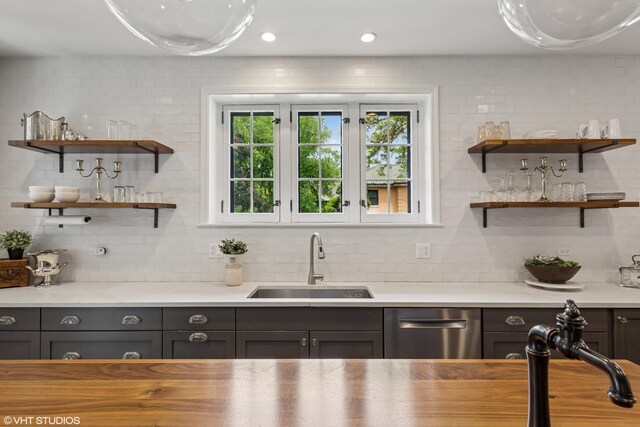 1141 N Ridgeland Ave, Oak Park, IL 60302 - kitchen with a sink, open shelves, tasteful backsplash, and light countertops