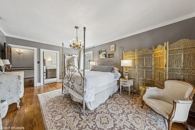 1141 N Ridgeland Ave, Oak Park, IL 60302 - bedroom with a chandelier, ornamental molding, wood finished floors, baseboards, and connected bathroom