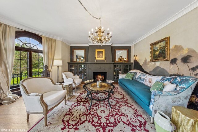 1141 N Ridgeland Ave, Oak Park, IL 60302 - living room featuring a chandelier, wood finished floors, crown molding, and a warm lit fireplace