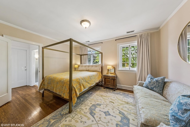 1141 N Ridgeland Ave, Oak Park, IL 60302 - bedroom with wood finished floors, ornamental molding, and baseboards