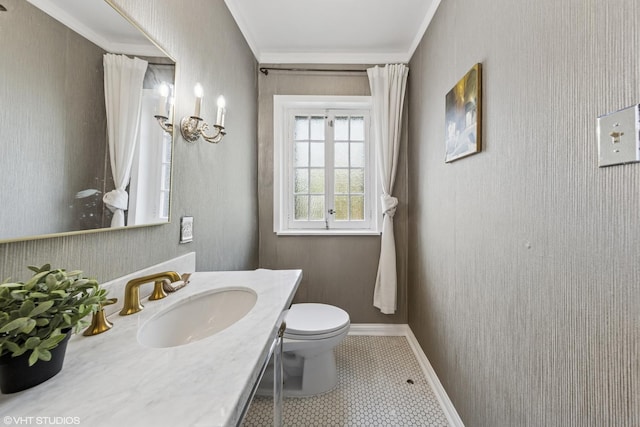 1141 N Ridgeland Ave, Oak Park, IL 60302 - bathroom with toilet, vanity, crown molding, baseboards, and tile patterned flooring