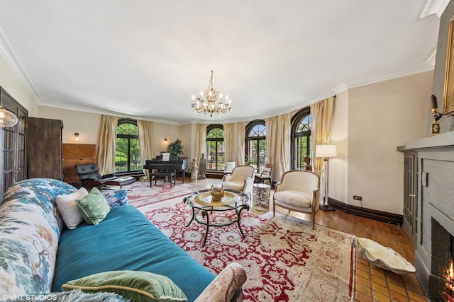 1141 N Ridgeland Ave, Oak Park, IL 60302 - living area with a brick fireplace, a chandelier, wood finished floors, ornamental molding, and baseboards
