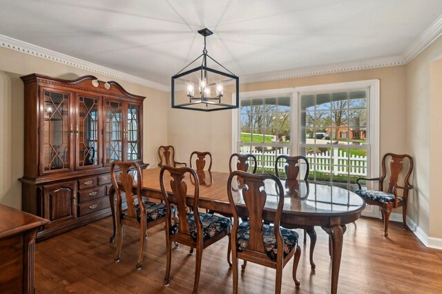 21956 N Hickory Hill Dr, Kildeer, IL 60047 - dining room with a chandelier, wood finished floors, ornamental molding, and baseboards