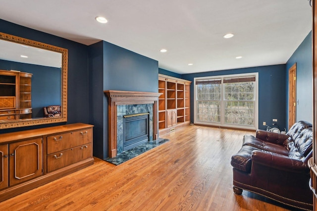 21956 N Hickory Hill Dr, Kildeer, IL 60047 - living room featuring light wood-style flooring, a high end fireplace, and recessed lighting