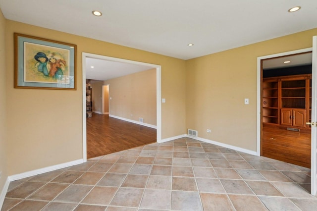 21956 N Hickory Hill Dr, Kildeer, IL 60047 - spare room featuring recessed lighting, light tile patterned flooring, and baseboards