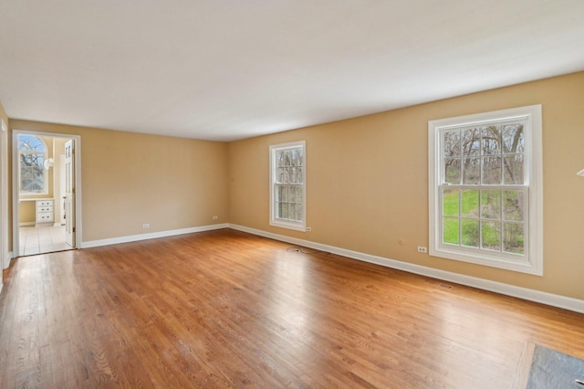21956 N Hickory Hill Dr, Kildeer, IL 60047 - empty room with wood finished floors and baseboards