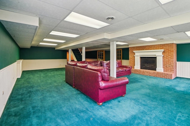 21956 N Hickory Hill Dr, Kildeer, IL 60047 - carpeted living room with wainscoting, a paneled ceiling, and a fireplace