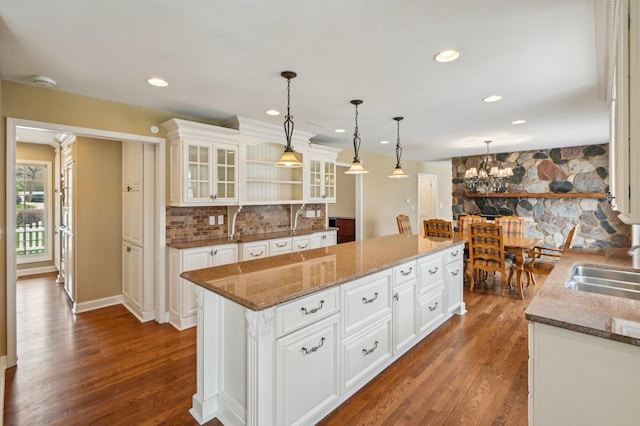 21956 N Hickory Hill Dr, Kildeer, IL 60047 - kitchen featuring open shelves, a sink, a center island, dark wood-style floors, and recessed lighting