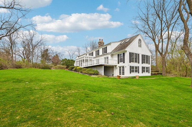 21956 N Hickory Hill Dr, Kildeer, IL 60047 - rear view of house with a chimney, a yard, and a wooden deck