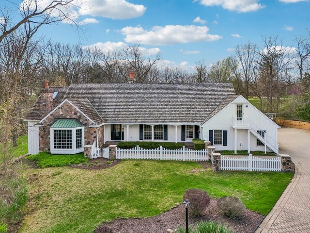 21956 N Hickory Hill Dr, Kildeer, IL 60047 - view of front of home with a chimney, stone siding, and stucco siding