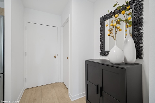 211 E Ohio St Unit 2819, Chicago, IL 60611 - corridor with light wood-style flooring and baseboards
