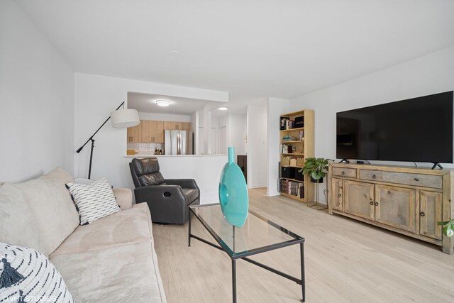 211 E Ohio St Unit 2819, Chicago, IL 60611 - living area featuring light wood-style floors