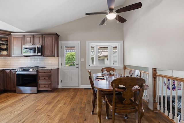 16906 Grissom Dr, Tinley Park, IL 60477 - kitchen with appliances with stainless steel finishes, vaulted ceiling, a ceiling fan, light wood-type flooring, and decorative backsplash