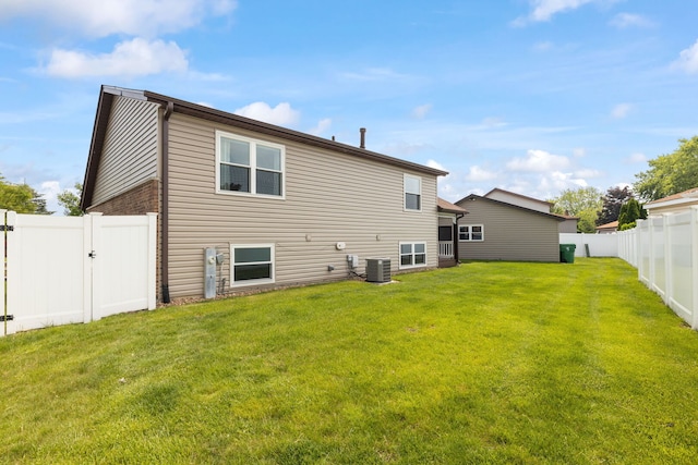 16906 Grissom Dr, Tinley Park, IL 60477 - back of house with central air condition unit and a gate