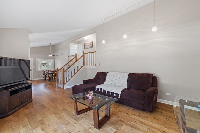 16906 Grissom Dr, Tinley Park, IL 60477 - living area featuring light wood-style floors, stairway, baseboards, ceiling fan, and vaulted ceiling