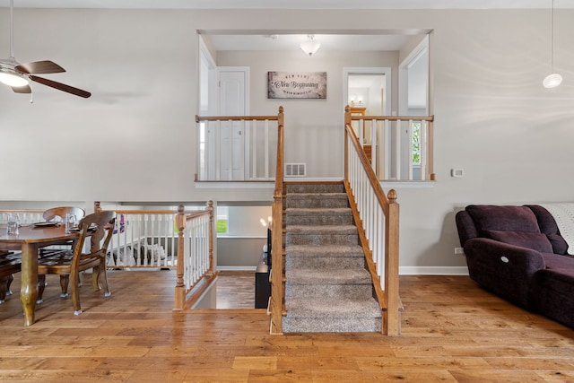16906 Grissom Dr, Tinley Park, IL 60477 - staircase featuring ceiling fan, wood finished floors, and baseboards