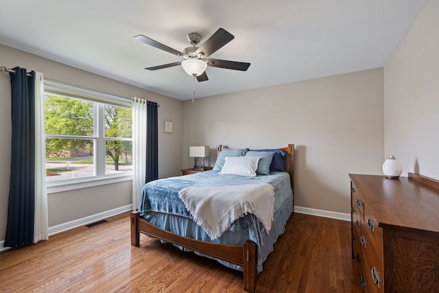 16906 Grissom Dr, Tinley Park, IL 60477 - bedroom featuring wood finished floors, baseboards, and ceiling fan