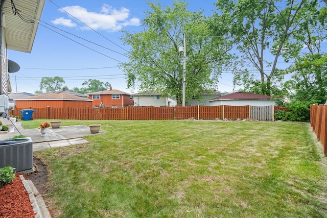 15240 Woodlawn Ave, Dolton, IL 60419 - view of yard with central AC and a patio