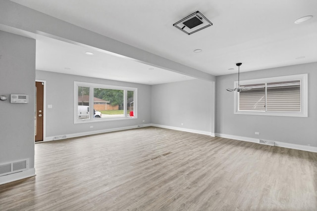 15240 Woodlawn Ave, Dolton, IL 60419 - empty room featuring wood finished floors and baseboards