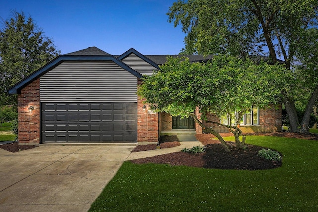 14814 Oakcreek Ct, Orland Park, IL 60467 - view of front of property with concrete driveway, brick siding, a garage, and a front lawn