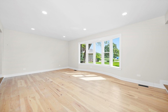 14814 Oakcreek Ct, Orland Park, IL 60467 - empty room featuring light wood-style flooring and recessed lighting