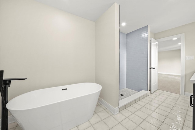 14814 Oakcreek Ct, Orland Park, IL 60467 - full bathroom with a freestanding bath, tile patterned flooring, recessed lighting, and a tile shower