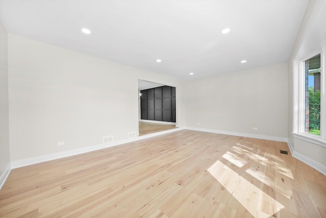 14814 Oakcreek Ct, Orland Park, IL 60467 - unfurnished room featuring light wood-style flooring and recessed lighting