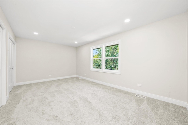 14814 Oakcreek Ct, Orland Park, IL 60467 - unfurnished bedroom featuring light carpet and recessed lighting