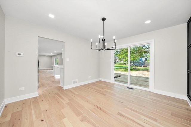 14814 Oakcreek Ct, Orland Park, IL 60467 - unfurnished dining area featuring a chandelier, light wood-type flooring, and recessed lighting