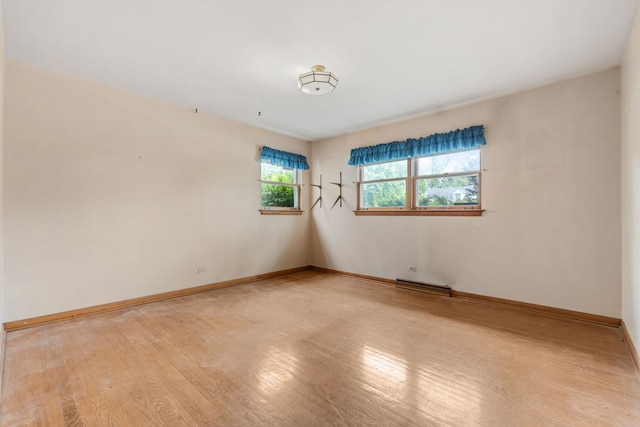493 W Avery St, Elmhurst, IL 60126 - spare room with light wood-type flooring and baseboards