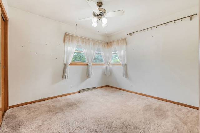 493 W Avery St, Elmhurst, IL 60126 - spare room featuring ceiling fan, carpet floors, and baseboards