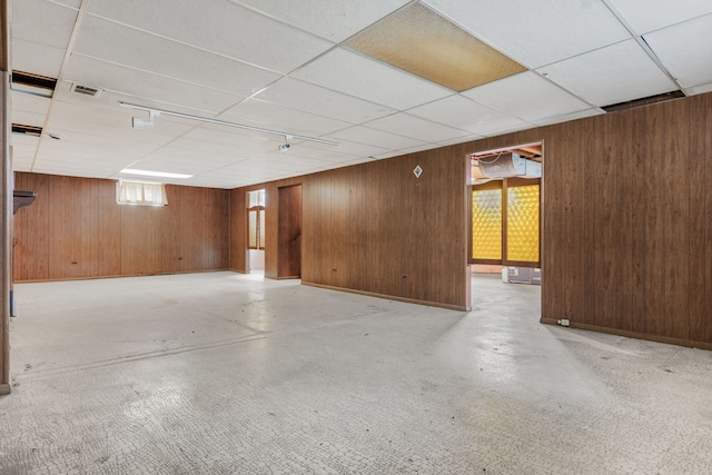 493 W Avery St, Elmhurst, IL 60126 - basement with wood walls, a paneled ceiling, and baseboards