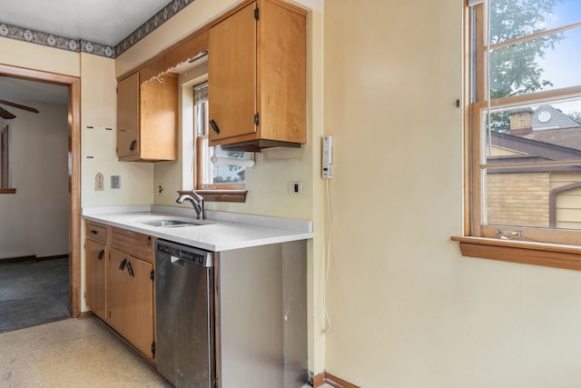 493 W Avery St, Elmhurst, IL 60126 - kitchen with stainless steel dishwasher, a sink, light countertops, ceiling fan, and light flooring