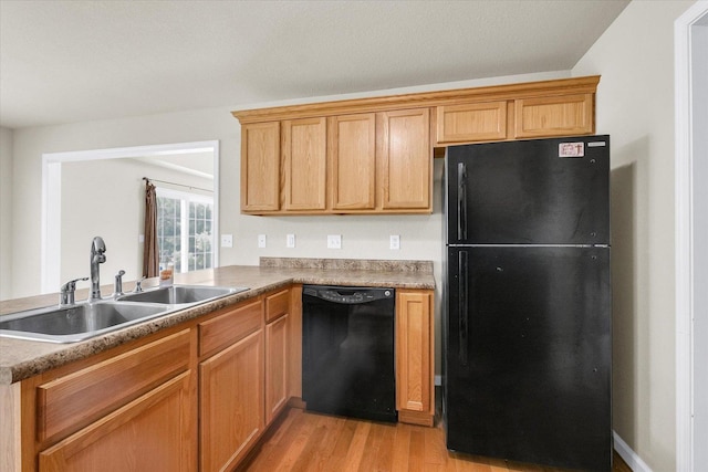 2303 Blanche Ln Unit B, Champaign, IL 61822 - kitchen featuring black appliances and light wood-style floors