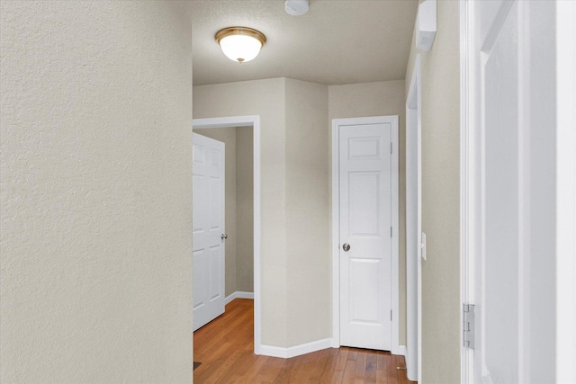 2303 Blanche Ln Unit B, Champaign, IL 61822 - hall featuring wood finished floors and a textured wall