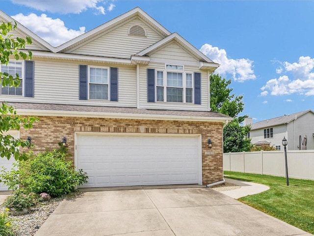 2303 Blanche Ln Unit B, Champaign, IL 61822 - view of front of property with brick siding, an attached garage, and concrete driveway
